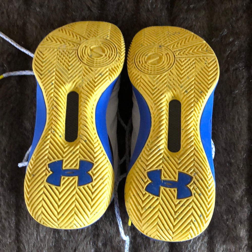 Under Armour high top sneakers.